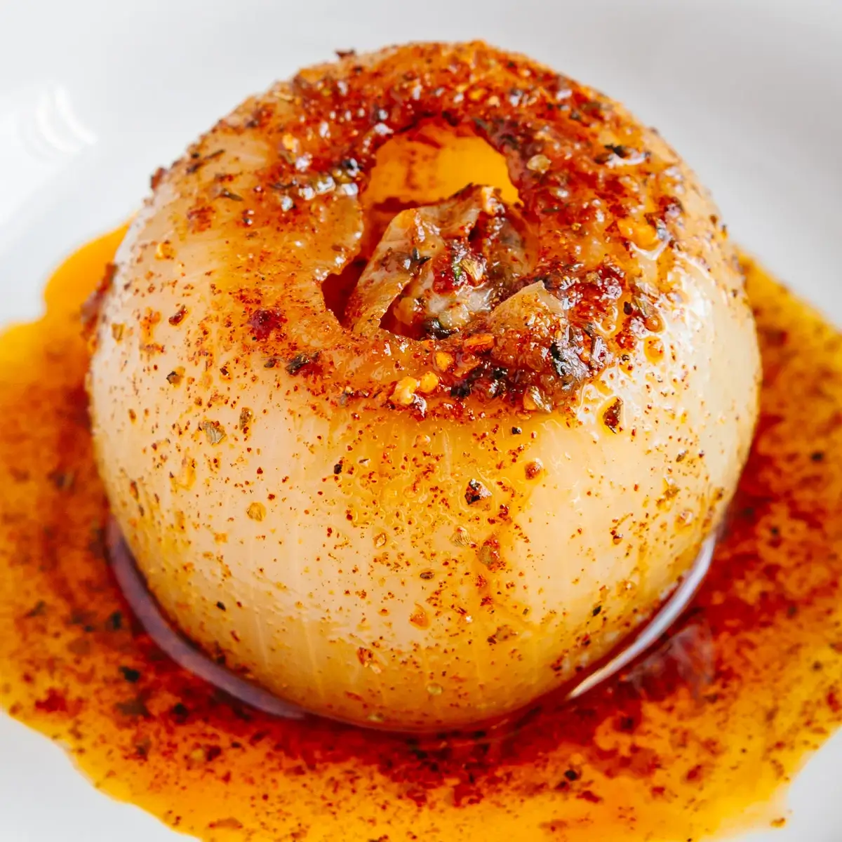 Onion boil recipe served as a flavorful side dish with roasted chicken and mashed potatoes